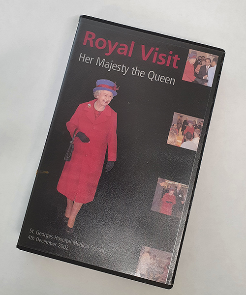 Cover of VHS tape of Queen Elizabeth II's visit to St George's in 2002.